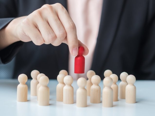 Businesswoman hand pulling leader man wooden from crowd of employees. Toxic People, Human resource