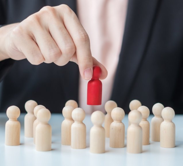 Businesswoman hand pulling leader man wooden from crowd of employees. Toxic People, Human resource