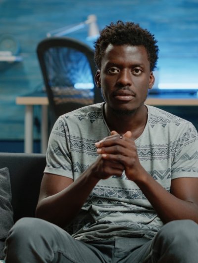 POV of person cheering at football game on television