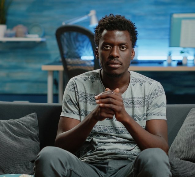 POV of person cheering at football game on television